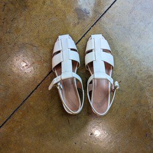 Me & Em cream colored leather fisherman style sandals with wooden heel. Size 9